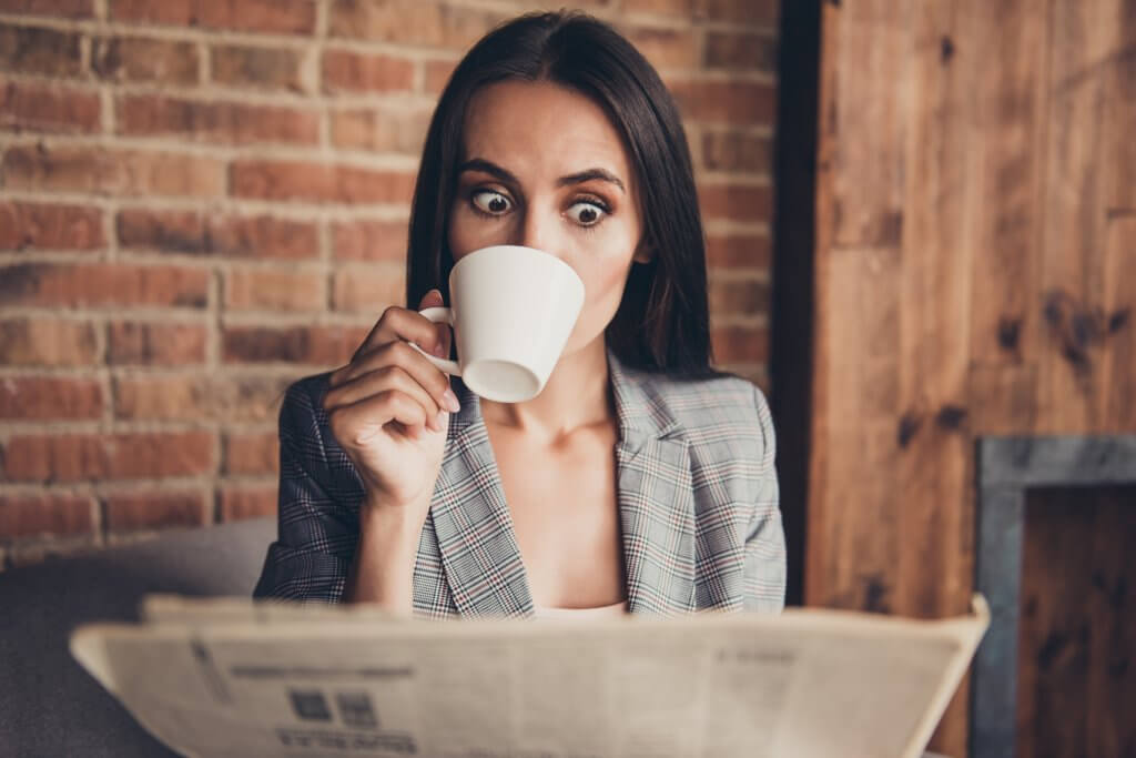 Woman Drinking Bulwark Coffee